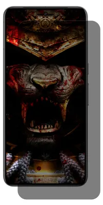A smartphone with a dark, graphic wallpaper is displayed against a white background.