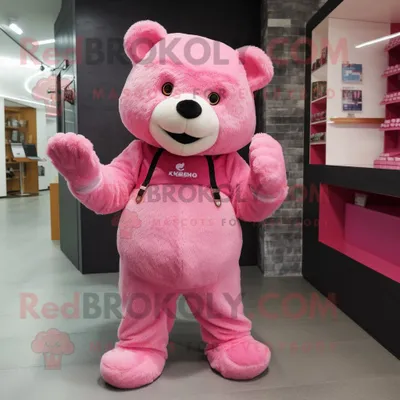 Produktbild von Rosa REDBROKOLY Bär Maskottchen Kostüm figur bekleidet mit einer Weste und Schuhclips