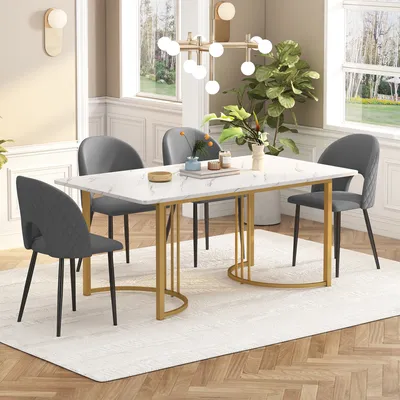 A dining set with a rectangular marble-top table and four gray upholstered chairs, set in a well-lit dining room.