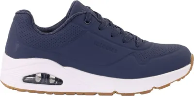 A side view of a blue Skechers Uno-Stand women's sneaker with a white sole and brown outsole.