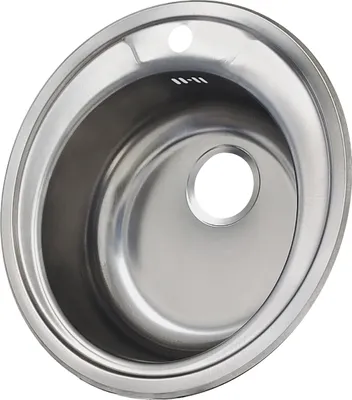 A stainless steel kitchen sink with a drain hole and an overflow hole.