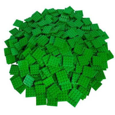 A pile of green LEGO baseplates.