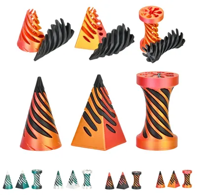 Zdjęcie produktu dla Zestaw Fidget Spiral 3w1 | Czarna podstawa, czerwono-złoty środek | Stożek, klepsydra i piramida | Wymienne elementy sensoryczne | 14+ – Czerwono-złoty
