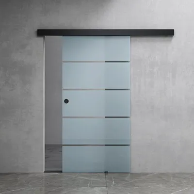 A modern glass sliding door with frosted horizontal stripes, mounted on a concrete wall.