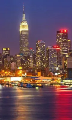Produktbild von Fototapete - Manhattan at Night 150x250cm - Vliestapete