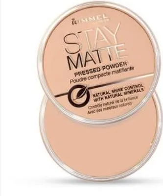 A Rimmel Stay Matte Pressed Powder compact is shown against a white background.