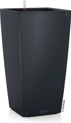 A tall, dark gray planter with a square base and top, featuring a water level indicator visible at the top.