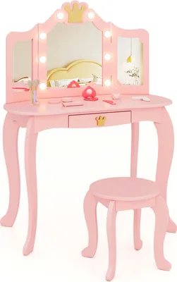 A pink princess vanity table and stool set with a lighted mirror.