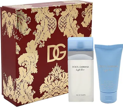 A gift set containing a perfume bottle and a body cream, presented in a decorative box.