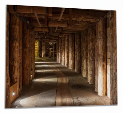 Produktbild von Wallario Herdabdeckplatte aus Glas, Größe 60 x 52 cm 1-teilig, Motiv Alter Tunnel in einer Salzmine in Polen