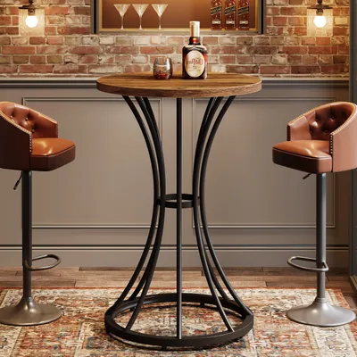 A bar area with a round table and two bar stools, featuring a bottle of liquor and a glass on the table.