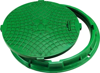 A green manhole cover and its frame are shown against a white background.