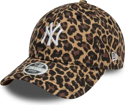 A close-up studio shot of a leopard-print New York Yankees baseball cap.