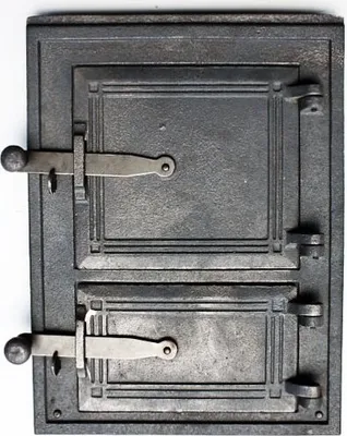 A close-up, front-facing studio shot of a cast iron oven door with two compartments and latches.