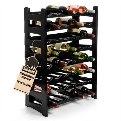 A black plastic wine rack filled with various wine bottles, with a product tag hanging from the side.