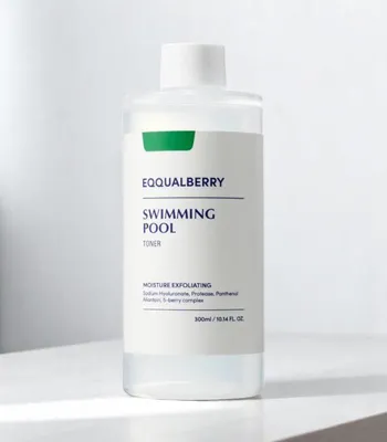 A clear studio shot of a bottle of EQQUALBERRY Swimming Pool Toner.