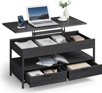 A lift-top coffee table with storage, shown with a laptop, phone, and books.