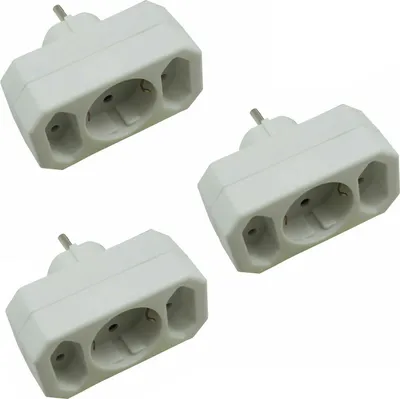 Three white electrical outlet adapters are arranged diagonally on a white background.