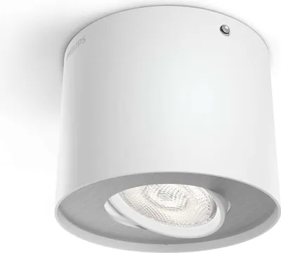 A white cylindrical ceiling light with a metallic gray trim around the bottom opening.