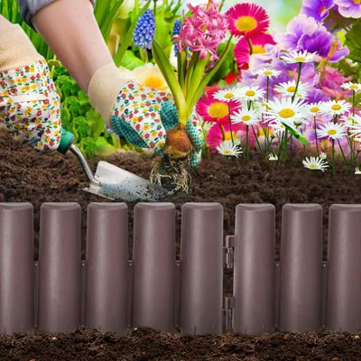 Produktbild von YZNAHRE Rasenkante Beeteinfassung Kunststoff Flexible Beetumrandung Beetbegrenzung Mähkante Holzimitat Rasenkantenband Gartenpalisade 15cm hoch (5,6m Braun)