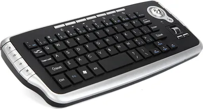 A black and silver wireless keyboard with a trackball mouse.
