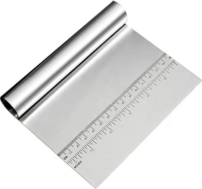 A stainless steel dough scraper with a ruler marking on the blade.