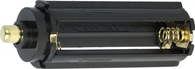 A black battery adapter for holding three AAA batteries to fit into a larger battery slot.