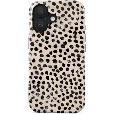 A close-up view of a phone case with a dalmatian-like pattern.