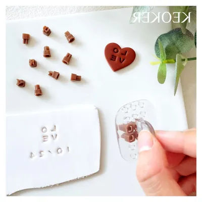 Zdjęcie produktu dla Stempel z cyframi i literami do gliny polimerowej