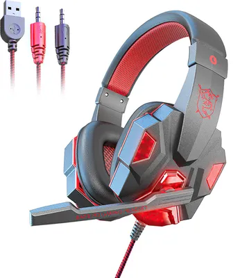 A gaming headset with a microphone and LED lights, shown against a white background. Three connector cables are visible in the upper left corner.