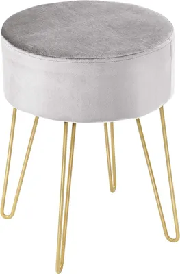 A light gray velvet stool with gold hairpin legs is shown against a white background.