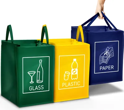 Three recycling bags for sorting waste.