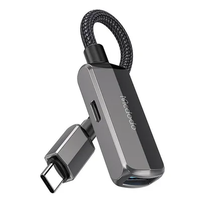 A close-up studio shot of a Mcdodo OTG adapter.