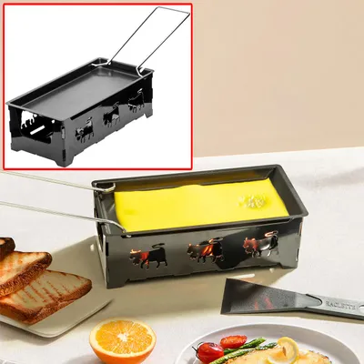 Produktbild von Teelicht-Raclette für 1-2 Personen, Raclette Set ohne Strom inkl. Teelichtern & Schaber, Metall mit originell ausgestanzten Kühen, antihaftbeschichtet
