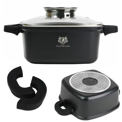 A product shot of a black square pot with a glass lid, and two black silicone pot handle covers, and the bottom of the pot.