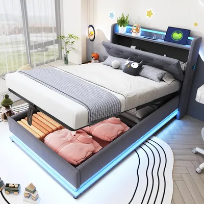A modern bed in a well-lit room, showing storage features and LED lighting.