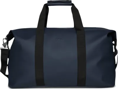 A studio shot of a navy blue duffel bag.