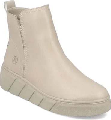 A single beige boot is shown against a white background.