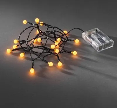 A string of yellow LED lights with a battery pack.