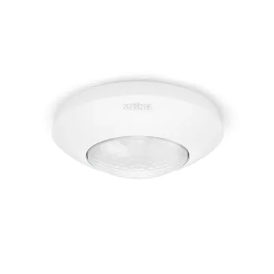 A white ceiling-mounted motion sensor is shown against a white background.