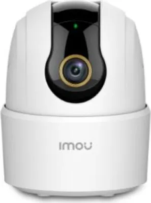 A white security camera with a black lens and a gold ring around the lens.