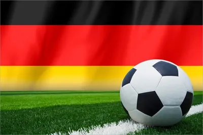 Produktbild von Wallario selbstklebendes Poster - Fußball vor einer Deutschlandflagge, Größe: 61 x 91,50 cm