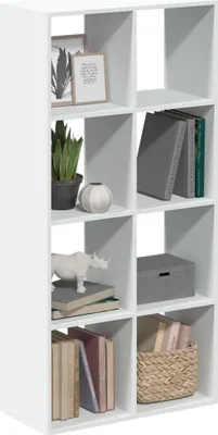 A white cube shelf unit filled with various decorative items and books.