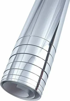 A roll of reflective, silver material, likely a mirror film, is shown against a white background.