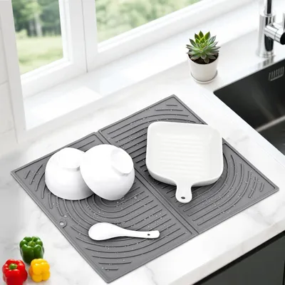 Produktbild von Silikon-Abtropfmatte 43×34 cm grau, saugfähig/faltbar/hitzebeständig.