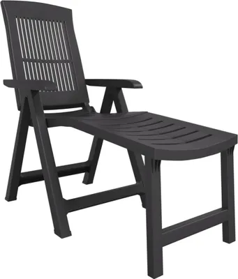A dark gray plastic sun lounger is shown against a white background.