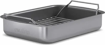 A roasting pan with a rack inside, shown from a diagonal angle.
