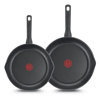 Two black frying pans with red logos in the center, displayed on a white background.