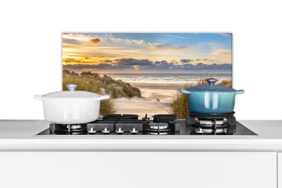 Produktbild von KitchenYeah®  Spritzschutz Küche - Küchenrückwand - Wandschutz für Herd und Spüle - Strand - Düne - Gras - Sonnenuntergang - Meer 60x30 - Alu-Dibond (Alternative zum Spritzschutz aus Glas) - Hitzebest