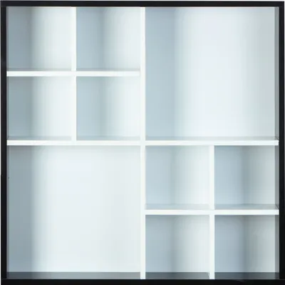 An empty white shelving unit with a black frame.